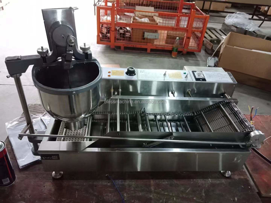 La machine à glaçage de beignets entièrement automatique économisant du travail bonne réputation 8 cm taille de beignets